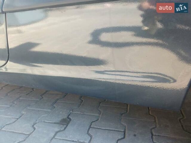Черный Опель Калибра, объемом двигателя 2 л и пробегом 256 тыс. км за 3000 $, фото 20 на Automoto.ua