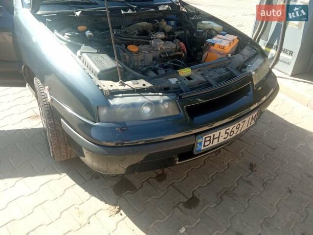 Черный Опель Калибра, объемом двигателя 2 л и пробегом 256 тыс. км за 3000 $, фото 14 на Automoto.ua