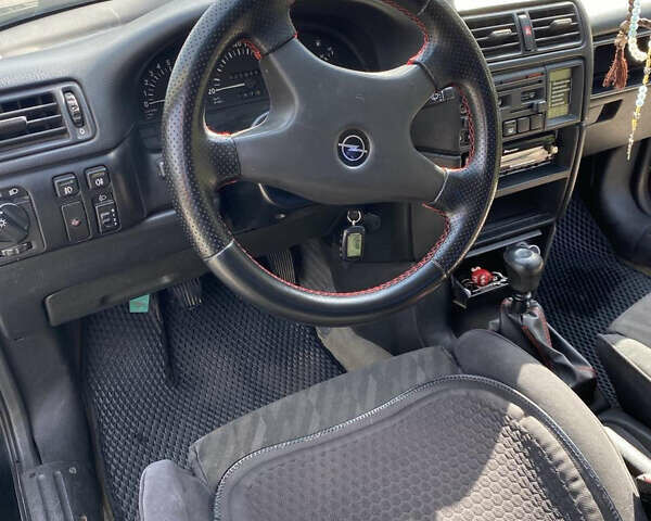 Черный Опель Калибра, объемом двигателя 2 л и пробегом 525 тыс. км за 2500 $, фото 3 на Automoto.ua