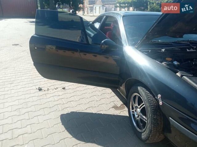 Черный Опель Калибра, объемом двигателя 2 л и пробегом 256 тыс. км за 3000 $, фото 15 на Automoto.ua