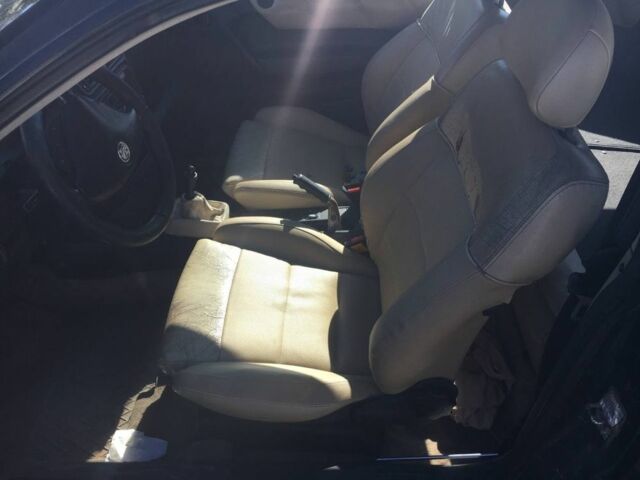 Черный Опель Калибра, объемом двигателя 2 л и пробегом 300 тыс. км за 1700 $, фото 6 на Automoto.ua