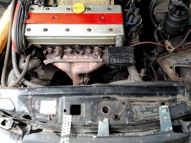 Чорний Опель Калібра, об'ємом двигуна 2 л та пробігом 520 тис. км за 2047 $, фото 6 на Automoto.ua