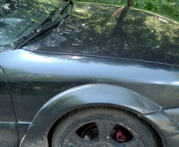 Чорний Опель Калібра, об'ємом двигуна 2 л та пробігом 520 тис. км за 2047 $, фото 12 на Automoto.ua