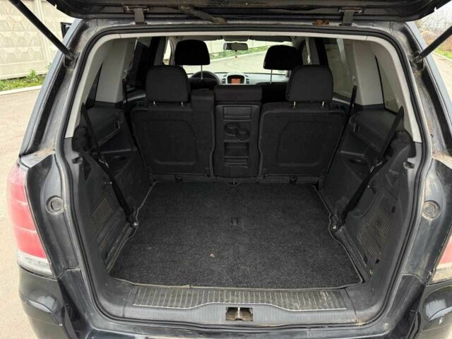 Черный Опель Калибра, объемом двигателя 1.9 л и пробегом 290 тыс. км за 2600 $, фото 2 на Automoto.ua