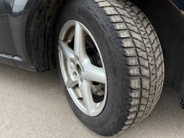 Черный Опель Калибра, объемом двигателя 1.9 л и пробегом 290 тыс. км за 2600 $, фото 1 на Automoto.ua