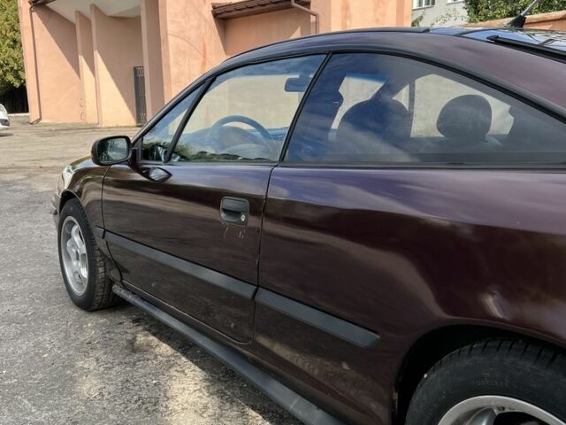 Фиолетовый Опель Калибра, объемом двигателя 2 л и пробегом 280 тыс. км за 2600 $, фото 4 на Automoto.ua