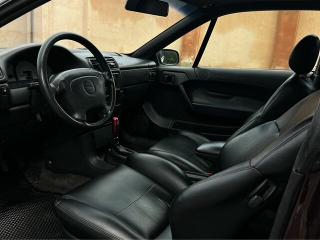 Фиолетовый Опель Калибра, объемом двигателя 2 л и пробегом 280 тыс. км за 2600 $, фото 10 на Automoto.ua