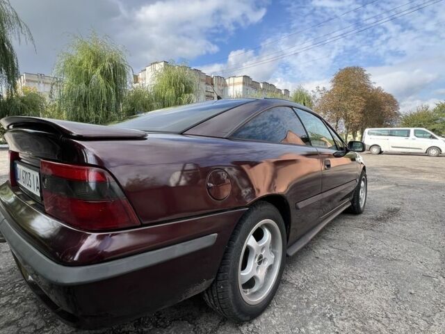 Фиолетовый Опель Калибра, объемом двигателя 2 л и пробегом 280 тыс. км за 2600 $, фото 7 на Automoto.ua