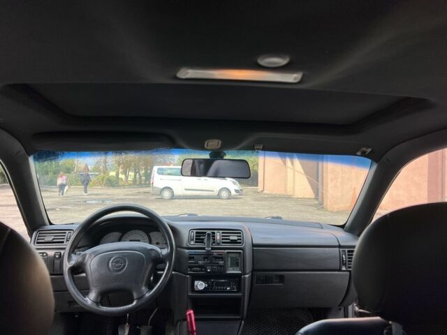 Фиолетовый Опель Калибра, объемом двигателя 2 л и пробегом 280 тыс. км за 2600 $, фото 18 на Automoto.ua