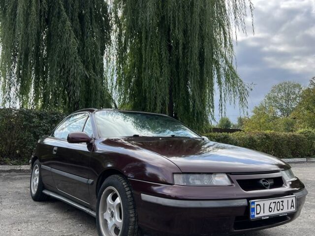 Фиолетовый Опель Калибра, объемом двигателя 2 л и пробегом 280 тыс. км за 2600 $, фото 1 на Automoto.ua