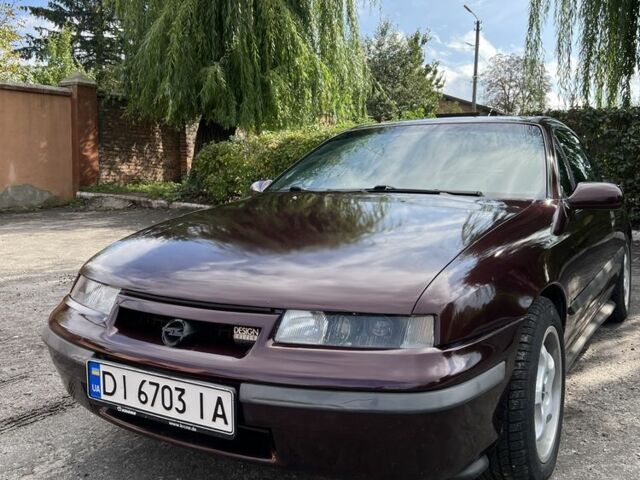 Фиолетовый Опель Калибра, объемом двигателя 2 л и пробегом 280 тыс. км за 2600 $, фото 2 на Automoto.ua