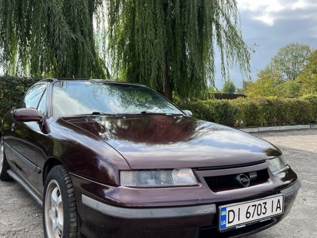 Фиолетовый Опель Калибра, объемом двигателя 2 л и пробегом 280 тыс. км за 2600 $, фото 3 на Automoto.ua