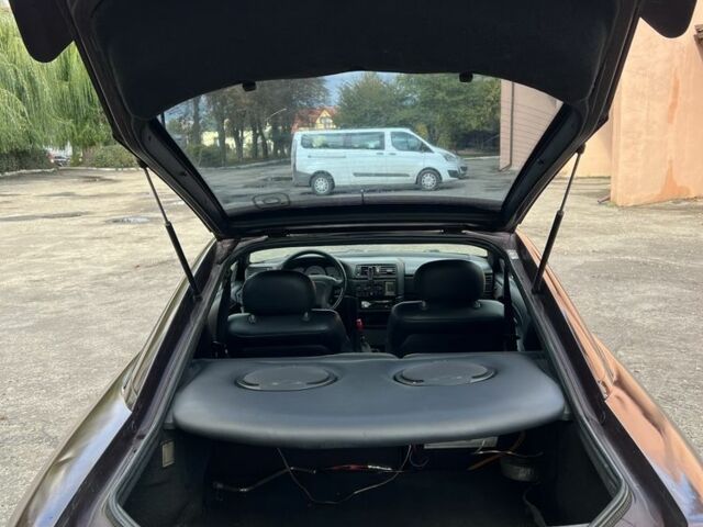 Фиолетовый Опель Калибра, объемом двигателя 2 л и пробегом 280 тыс. км за 2600 $, фото 5 на Automoto.ua