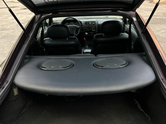 Фиолетовый Опель Калибра, объемом двигателя 2 л и пробегом 280 тыс. км за 2600 $, фото 8 на Automoto.ua