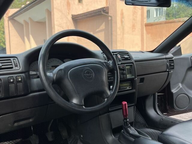 Фиолетовый Опель Калибра, объемом двигателя 2 л и пробегом 280 тыс. км за 2600 $, фото 17 на Automoto.ua