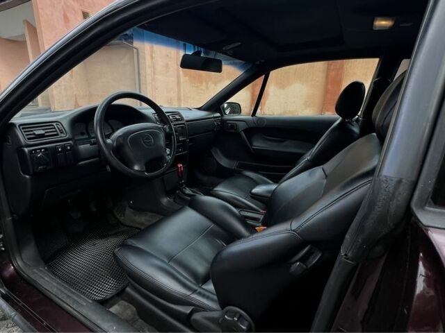 Фиолетовый Опель Калибра, объемом двигателя 2 л и пробегом 280 тыс. км за 2600 $, фото 11 на Automoto.ua