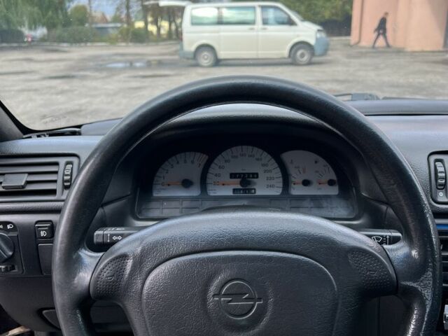 Фиолетовый Опель Калибра, объемом двигателя 2 л и пробегом 280 тыс. км за 2600 $, фото 13 на Automoto.ua