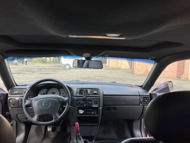 Фиолетовый Опель Калибра, объемом двигателя 2 л и пробегом 280 тыс. км за 2600 $, фото 15 на Automoto.ua