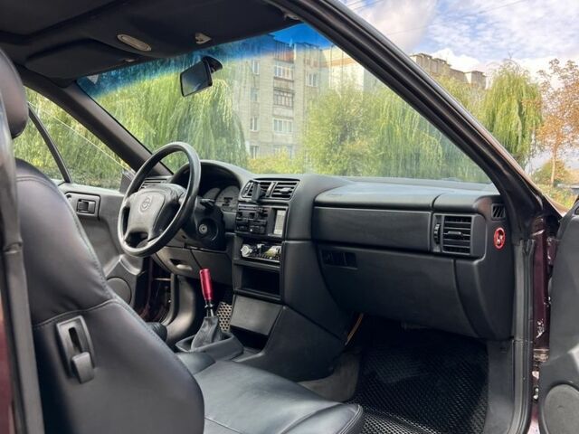 Фиолетовый Опель Калибра, объемом двигателя 2 л и пробегом 280 тыс. км за 2600 $, фото 9 на Automoto.ua