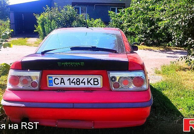 Червоний Опель Калібра, об'ємом двигуна 2 л та пробігом 0 тис. км за 2000 $, фото 3 на Automoto.ua