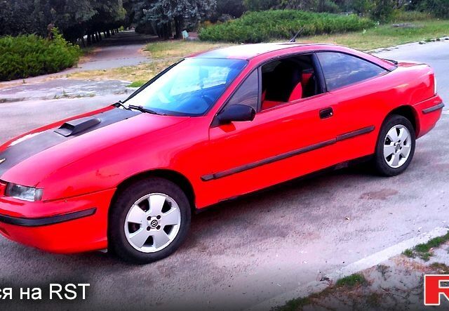 Червоний Опель Калібра, об'ємом двигуна 2 л та пробігом 0 тис. км за 2000 $, фото 2 на Automoto.ua