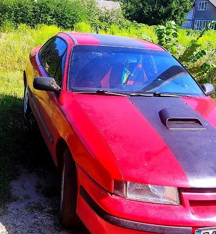 Червоний Опель Калібра, об'ємом двигуна 2 л та пробігом 0 тис. км за 2000 $, фото 1 на Automoto.ua