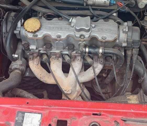 Красный Опель Калибра, объемом двигателя 2 л и пробегом 497 тыс. км за 1500 $, фото 1 на Automoto.ua