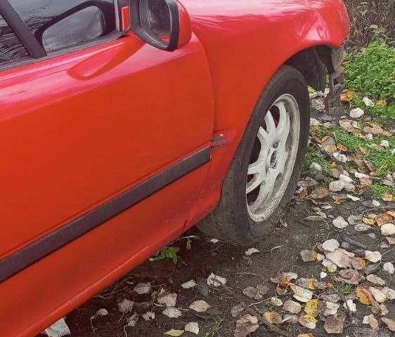 Красный Опель Калибра, объемом двигателя 2 л и пробегом 497 тыс. км за 1200 $, фото 9 на Automoto.ua