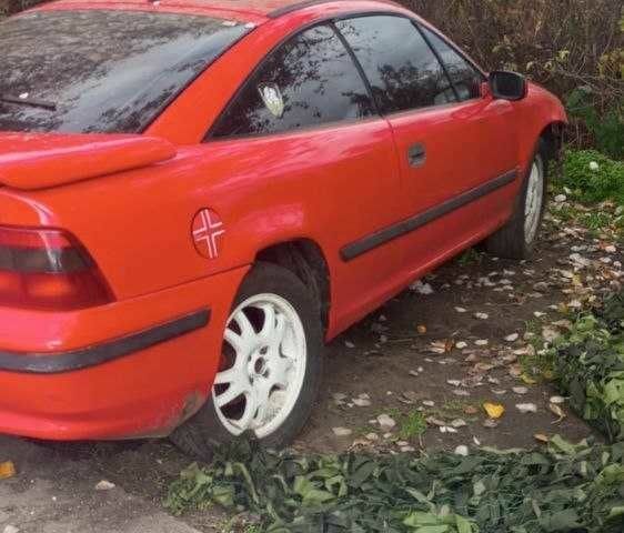 Красный Опель Калибра, объемом двигателя 2 л и пробегом 497 тыс. км за 1200 $, фото 11 на Automoto.ua