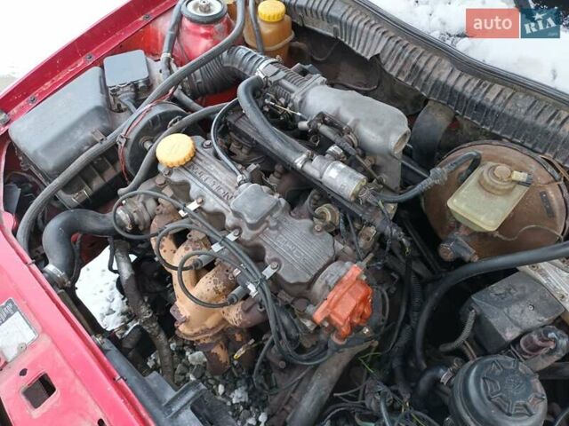 Червоний Опель Калібра, об'ємом двигуна 2 л та пробігом 412 тис. км за 1850 $, фото 20 на Automoto.ua