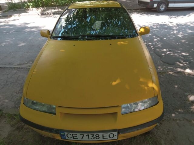 Жовтий Опель Калібра, об'ємом двигуна 2 л та пробігом 300 тис. км за 1500 $, фото 5 на Automoto.ua