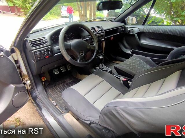 Сірий Опель Калібра, об'ємом двигуна 2 л та пробігом 333 тис. км за 1500 $, фото 4 на Automoto.ua