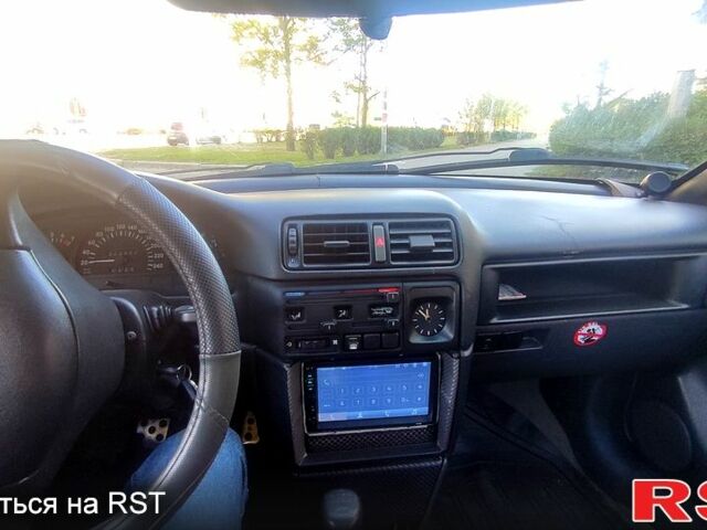 Сірий Опель Калібра, об'ємом двигуна 2 л та пробігом 333 тис. км за 1500 $, фото 5 на Automoto.ua