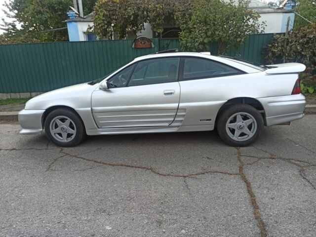 Сірий Опель Калібра, об'ємом двигуна 2 л та пробігом 317 тис. км за 2700 $, фото 6 на Automoto.ua