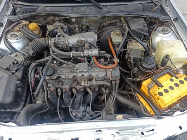 Сірий Опель Калібра, об'ємом двигуна 2 л та пробігом 317 тис. км за 2700 $, фото 15 на Automoto.ua