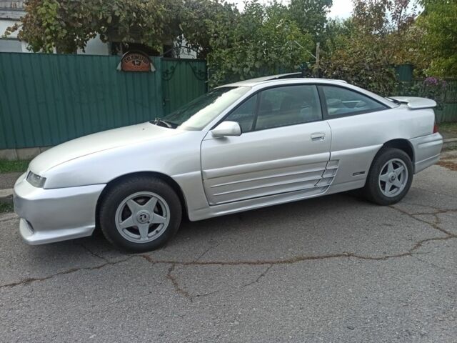 Сірий Опель Калібра, об'ємом двигуна 2 л та пробігом 317 тис. км за 2700 $, фото 5 на Automoto.ua