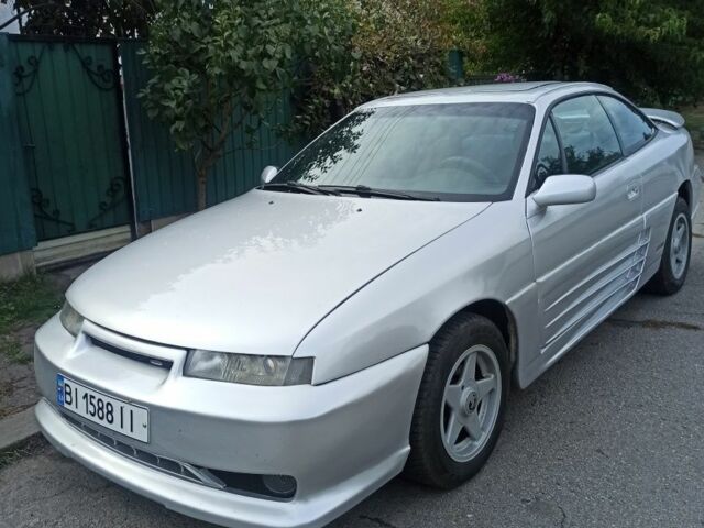 Сірий Опель Калібра, об'ємом двигуна 2 л та пробігом 317 тис. км за 2700 $, фото 1 на Automoto.ua