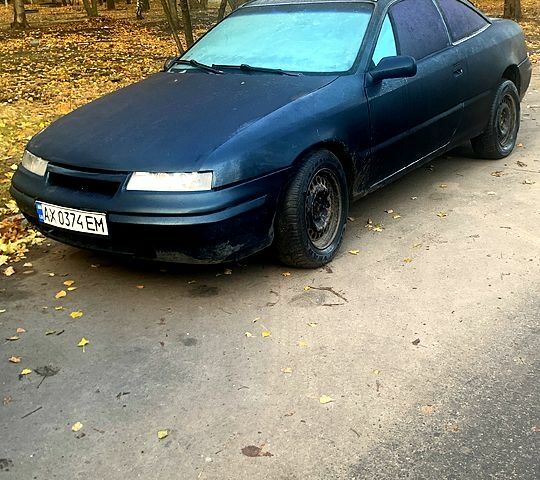 Синій Опель Калібра, об'ємом двигуна 1.6 л та пробігом 160 тис. км за 2000 $, фото 5 на Automoto.ua