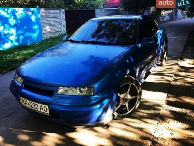 Синий Опель Калибра, объемом двигателя 2 л и пробегом 280 тыс. км за 2500 $, фото 3 на Automoto.ua