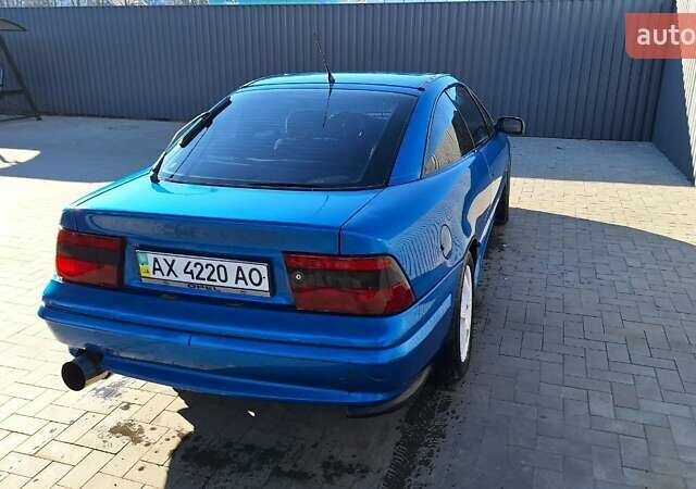 Синий Опель Калибра, объемом двигателя 2 л и пробегом 280 тыс. км за 2500 $, фото 4 на Automoto.ua