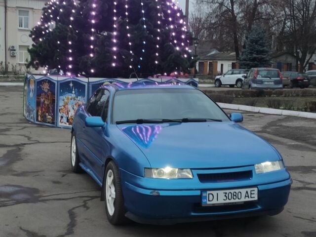 Синий Опель Калибра, объемом двигателя 2 л и пробегом 3 тыс. км за 2500 $, фото 14 на Automoto.ua