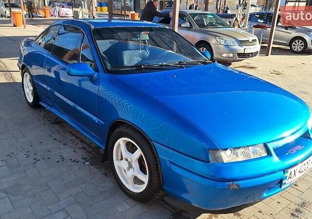 Синий Опель Калибра, объемом двигателя 2 л и пробегом 280 тыс. км за 2500 $, фото 7 на Automoto.ua