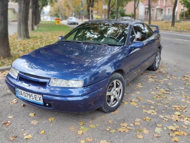 Синій Опель Калібра, об'ємом двигуна 2 л та пробігом 322 тис. км за 3509 $, фото 2 на Automoto.ua