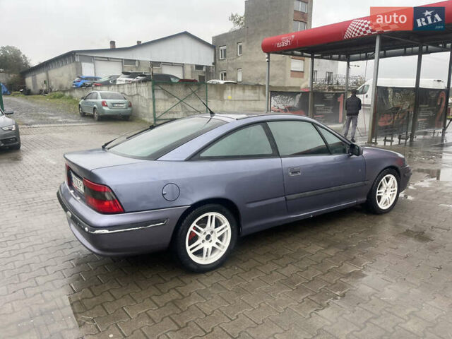 Синій Опель Калібра, об'ємом двигуна 3.2 л та пробігом 170 тис. км за 4500 $, фото 12 на Automoto.ua