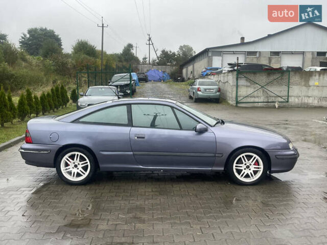 Синій Опель Калібра, об'ємом двигуна 3.2 л та пробігом 170 тис. км за 4500 $, фото 14 на Automoto.ua