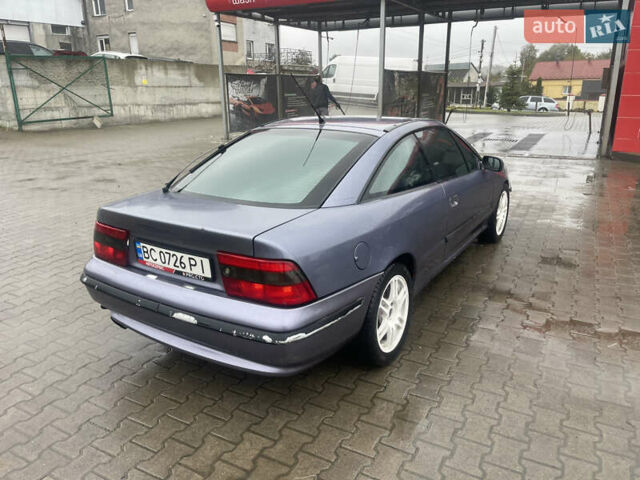 Синій Опель Калібра, об'ємом двигуна 3.2 л та пробігом 170 тис. км за 4500 $, фото 11 на Automoto.ua