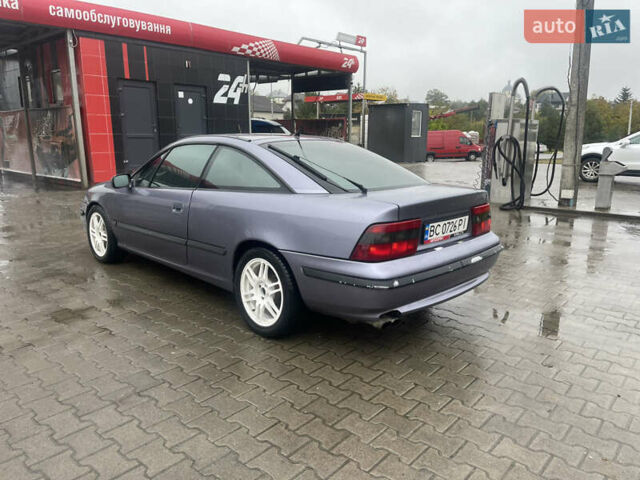 Синій Опель Калібра, об'ємом двигуна 3.2 л та пробігом 170 тис. км за 4500 $, фото 7 на Automoto.ua