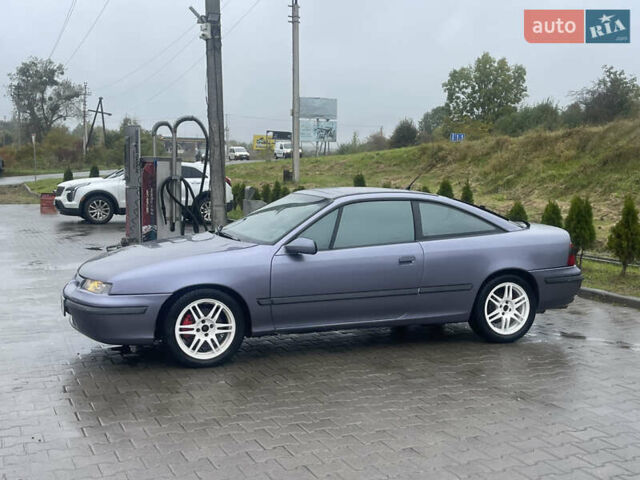 Синій Опель Калібра, об'ємом двигуна 3.2 л та пробігом 170 тис. км за 4300 $, фото 3 на Automoto.ua