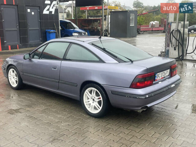 Синій Опель Калібра, об'ємом двигуна 3.2 л та пробігом 170 тис. км за 4500 $, фото 6 на Automoto.ua