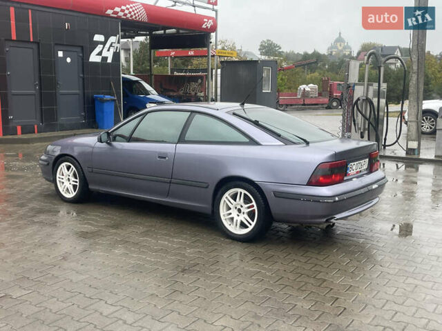 Синій Опель Калібра, об'ємом двигуна 3.2 л та пробігом 170 тис. км за 4300 $, фото 5 на Automoto.ua